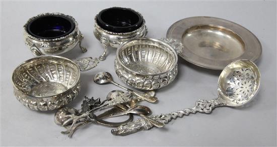 A Victorian cast silver sifter spoon, London, 1873, a small silver alms dish, a pair of Georgian bun salts etc.